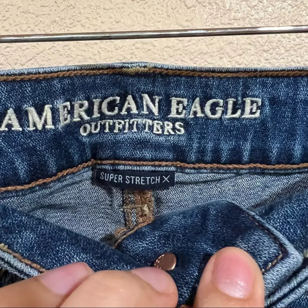 American Eagle Outfitters lightly distressed medium blue high rise mini skirt
